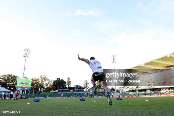 The Force warm up before the round nine Super Rugby Pacific match between the Western Force and the NSW Waratahs at HBF Park on April 16, 2022 in...