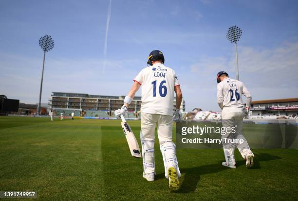 Sam Cook and Alastair Cook of Essex make their way out to bat during Day Three of the LV= Insurance County Championship match between Somerset and...