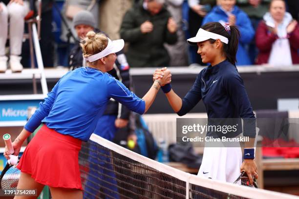 Emma Raducanu of Great Britain congratulates Marketa Vondrousova of Czech Republic on her victory during day two of the Billie Jean King Cup Play-Off...