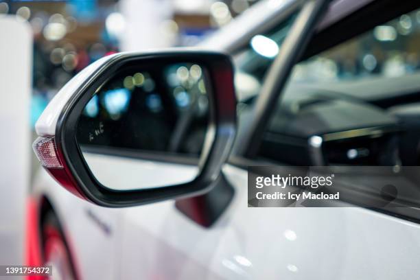 side shot of a car - showing the driver's side door and its mirror - vehicle mirror stock pictures, royalty-free photos & images