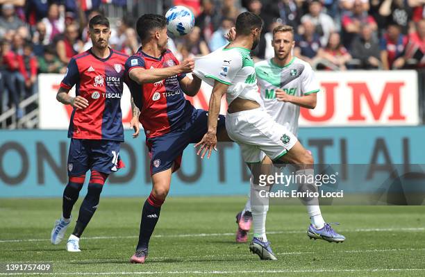 Andrea Carboni of Cagliari in contrast during the Serie A match between Cagliari Calcio and US Sassuolo at Sardegna Arena on April 16, 2022 in...
