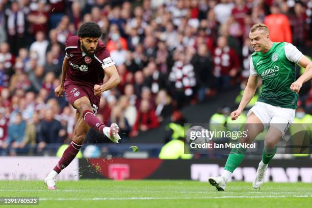 Ellis Simms of Heart of Midlothian scores their team's first goal during the Scottish Cup Semi Final match between Heart Of Midlothian FC and...
