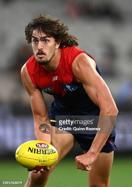 Luke Jackson of the Demons handballs during the round five AFL match between the Melbourne Demons and the Greater Western Sydney Giants at Melbourne...