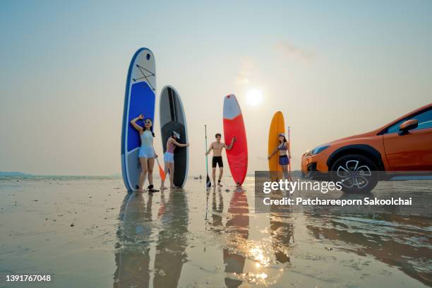 the summer fun - car splashing water on people stock pictures, royalty-free photos & images