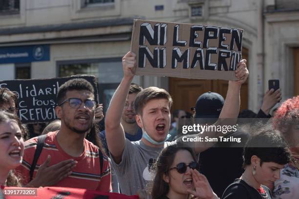 Protesters demonstrate against the rise of the far-right in French politics, on April 16, 2022 in Paris, France. The banner translates as "Neither Le...