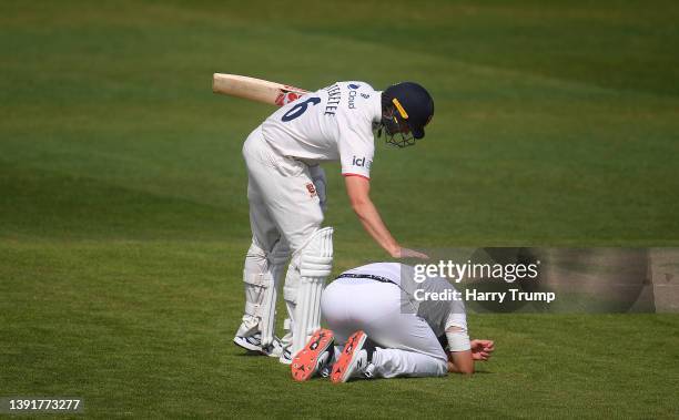 Craig Overton of Somerset is consoled by Mark Steketee of Essex following Day Three of the LV= Insurance County Championship match between Somerset...