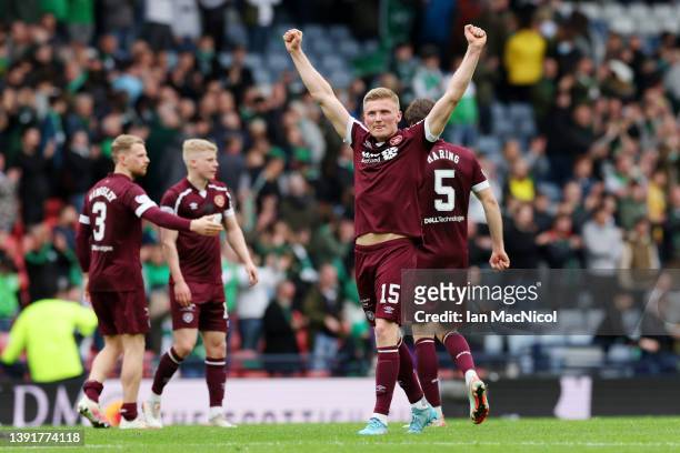 Taylor Moore of Heart of Midlothian celebrates following their side's victory and advancement in the Scottish Cup Semi Final match between Heart Of...