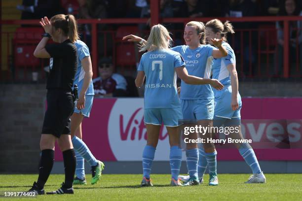 Lauren Hemp of Manchester City celebrates with team mate Laura Coombs after scoring their sides third goal during The Vitality Women's FA Cup...