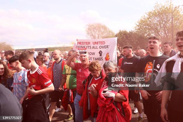 Manchester United fans take part in a protest outside the stadium prior to the Premier League match between Manchester United and Norwich City at Old...