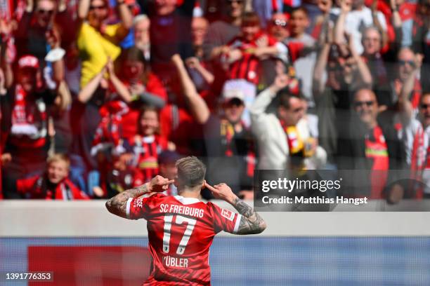 Lukas Kuebler of SC Freiburg celebrates after scoring their team's first goal during the Bundesliga match between Sport-Club Freiburg and VfL Bochum...