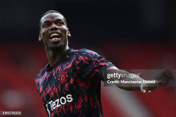 Paul Pogba of Manchester United warms up ahead of the Premier League match between Manchester United and Norwich City at Old Trafford on April 16,...