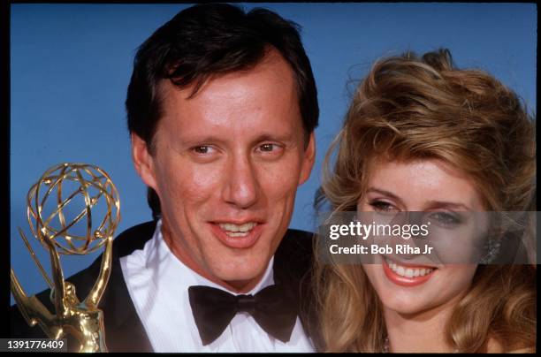 Emmy Winner James Woods with Sarah Owens backstage at the Emmy Awards Show, September 20, 1987 in Pasadena, California.