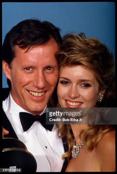 Emmy Winner James Woods with Sarah Owens backstage at the Emmy Awards Show, September 20, 1987 in Pasadena, California.