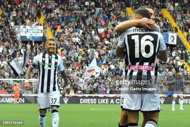 Nahuel Molina and players of Udinese Calcio celebrates after scored via autogoal by Ardian Ismajili of Empoli FC during the Serie A match between...