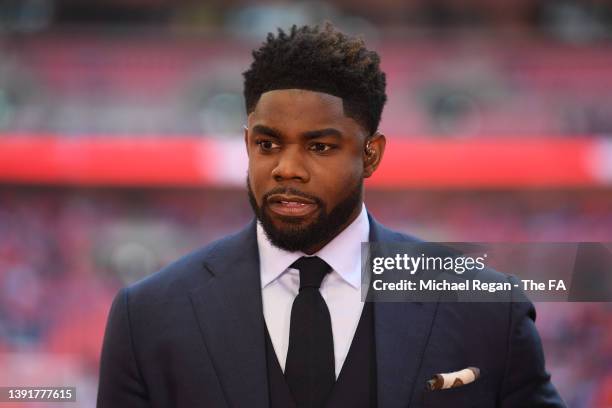 Pundit, Micah Richards looks on prior to The Emirates FA Cup Semi-Final match between Manchester City and Liverpool at Wembley Stadium on April 16,...