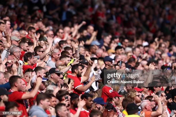 Manchester United fans show their support prior to the Premier League match between Manchester United and Norwich City at Old Trafford on April 16,...