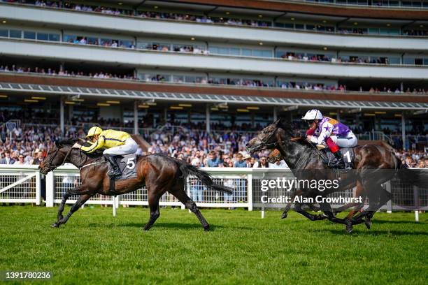 Christophe Soumillon riding Perfect Power win The Watership Down Stud Too Darn Hot Greenham Stakes at Newbury Racecourse on April 16, 2022 in...