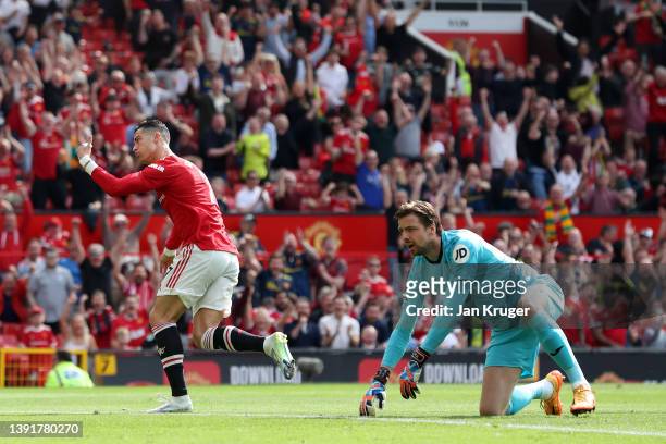 Cristiano Ronaldo of Manchester United celebrates after scoring their sides first goal past Tim Krul of Norwich City during the Premier League match...