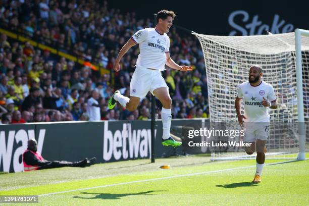 Christian Norgaard of Brentford celebrates after scoring their team's first goal during the Premier League match between Watford and Brentford at...