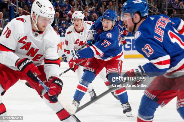 Frank Vatrano of the New York Rangers skates with the puck against the Carolina Hurricanes at Madison Square Garden on April 12, 2022 in New York...