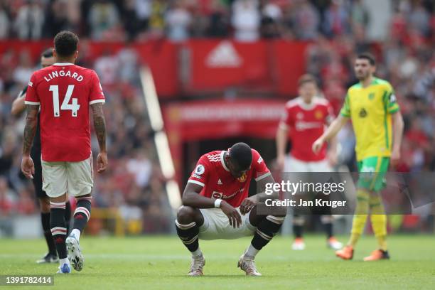 Paul Pogba of Manchester United reacts during the Premier League match between Manchester United and Norwich City at Old Trafford on April 16, 2022...