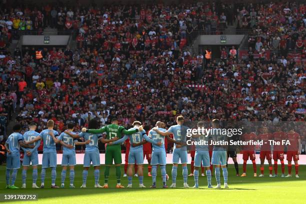 Both teams, fans and officials stand for a minute silence in memory of those who died during the Hillsborough disaster prior to The Emirates FA Cup...