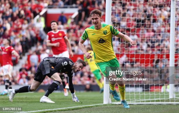 Kieran Dowell of Norwich City celebrates after scoring their sides first goal during the Premier League match between Manchester United and Norwich...