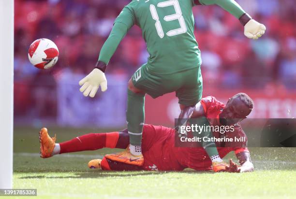 Sadio Mane of Liverpool scores their side's second goal past Zack Steffen of Manchester City during The Emirates FA Cup Semi-Final match between...