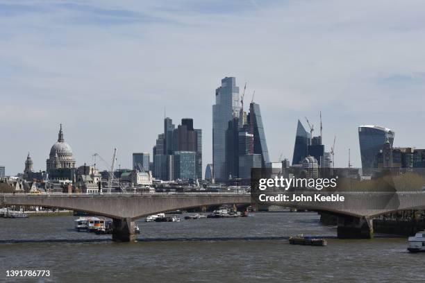 General view of the London skyline from the Golden Jubilee Bridge looking toward Waterloo bridge, St Paul's Cathedral, The Heron Tower , National...