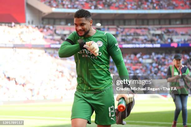 Zack Steffen of Manchester City reacts as they leave the field after the first half during The Emirates FA Cup Semi-Final match between Manchester...