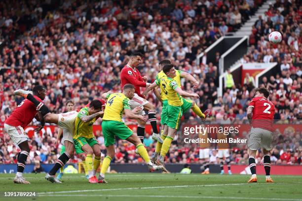 Cristiano Ronaldo of Manchester United wins a header during the Premier League match between Manchester United and Norwich City at Old Trafford on...