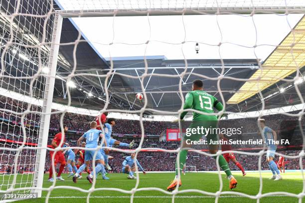 Ibrahima Konate of Liverpool scores their side's first goal past Zack Steffen of Manchester City during The Emirates FA Cup Semi-Final match between...