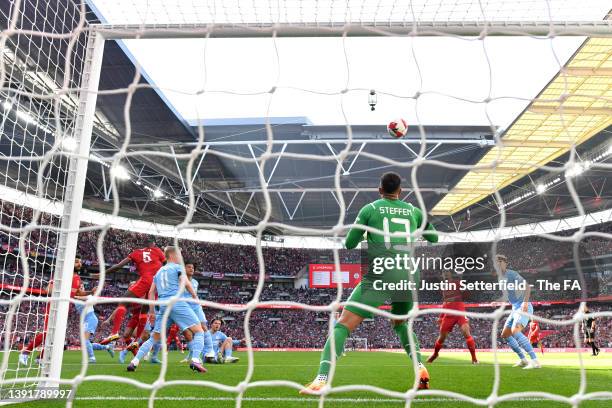 Ibrahima Konate of Liverpool scores their side's first goal past Zack Steffen of Manchester City during The Emirates FA Cup Semi-Final match between...