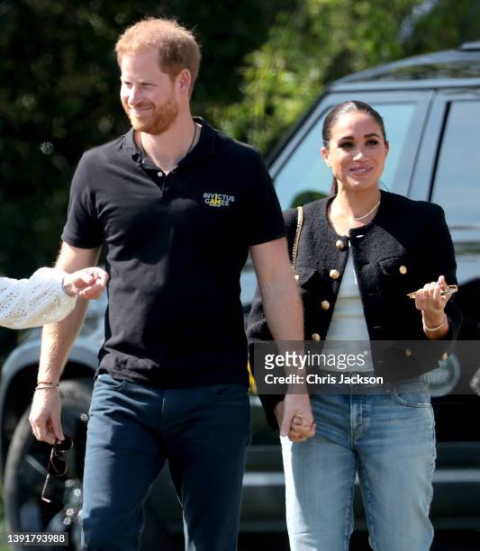 Meghan, Duchess of Sussex and Prince Harry, Duke of Cambirdge attend the Jaguar Land Rover Driving Challenge on day one of the Invictus Games The...
