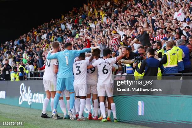 Pontus Jansson of Brentford celebrates with teammates after scoring their team's second goal during the Premier League match between Watford and...