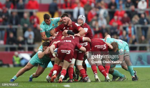 Munster's Jean Kleyn is tackled by Sam Skinner of Exeter Chiefs in a rolling maul during the Heineken Champions Cup Round of 16 Leg Two match between...