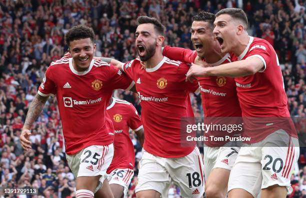 Cristiano Ronaldo of Manchester United celebrates scoring their third goal during the Premier League match between Manchester United and Norwich City...