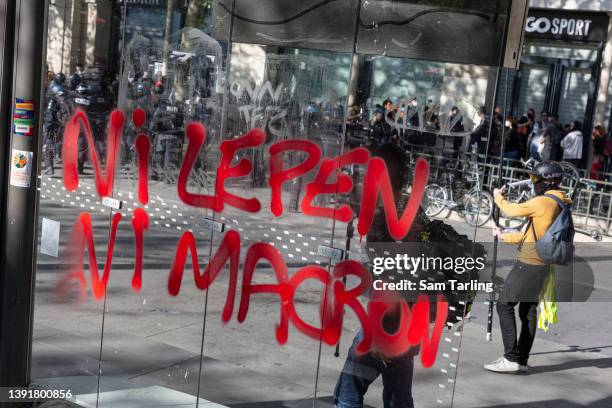 Grafitit that translates as "Neither Macron nor Le Pen" seen as protesters demonstrate against the rise of the far-right in French politics, on April...