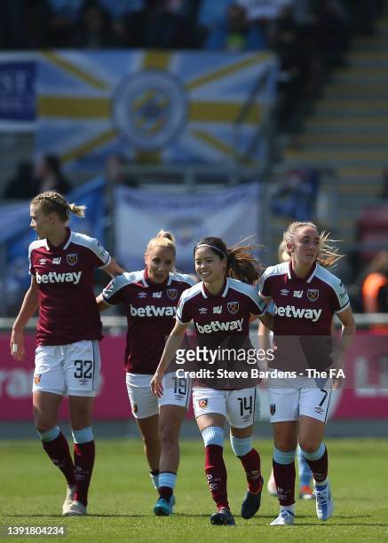 Lisa Evans of West Ham United celebrates with team mates Yui Hasegawa, Adriana Leon and Dagny Brynjarsdottir after scoring their sides first goal...