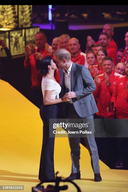 Meghan, Duchess of Sussex and Prince Harry, Duke of Sussex appear on stage during the Invictus Games The Hague 2020 Opening Ceremony at Zuiderpark on...