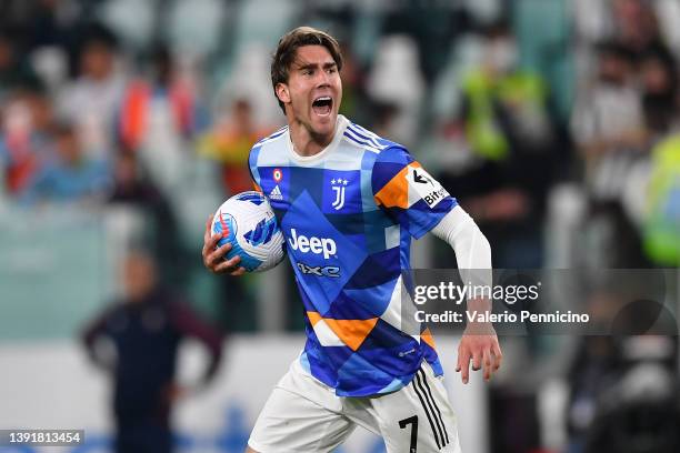 Dusan Vlahovic of Juventus celebrates scoring their side's first goal during the Serie A match between Juventus and Bologna FC at Allianz Stadium on...