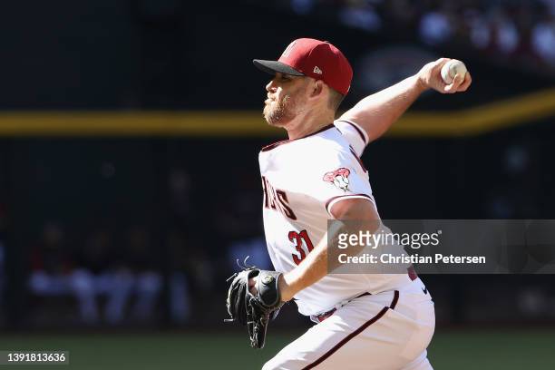 Relief pitcher Ian Kennedy of the Arizona Diamondbacks pitches against the Houston Astros during the MLB game at Chase Field on April 13, 2022 in...
