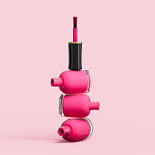 Nail polish stacked bottles isolated on pink background 3d illustration