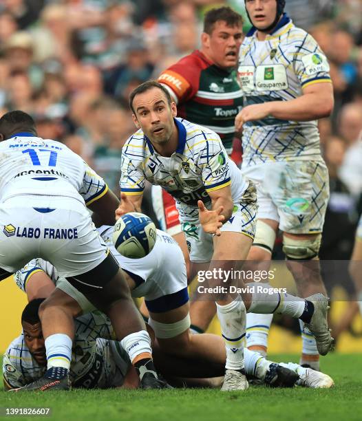 Morgan Parra of Clermont Auvergne passes the ball during the Heineken Champions Cup Round of 16 Leg Two match between Leicester Tigers and ASM...