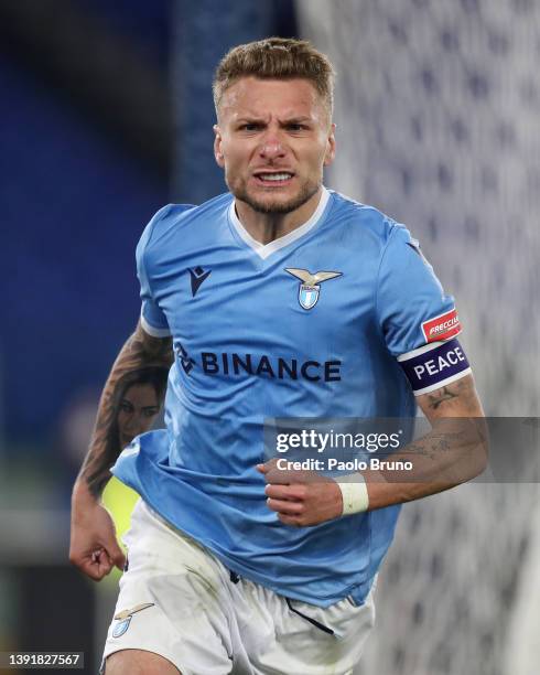 Ciro Immobile of Lazio celebrates scoring their side's first goal during the Serie A match between SS Lazio and Torino FC at Stadio Olimpico on April...