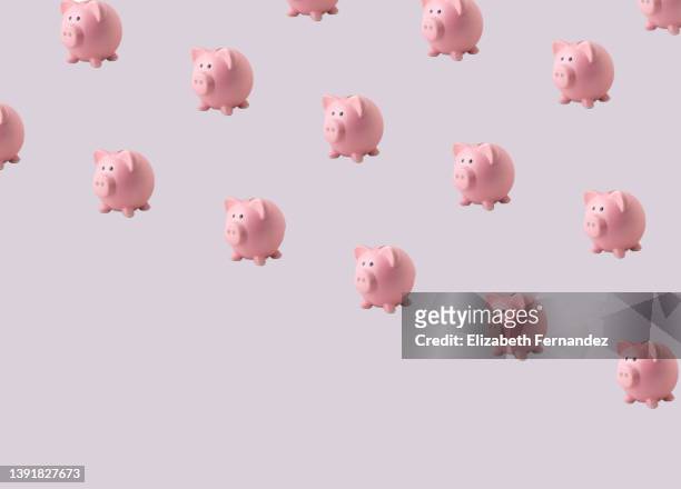 seamless pattern of piggy banks on gray background, copy space on image - abundance stock illustrations stock pictures, royalty-free photos & images