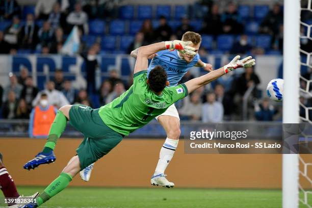 Ciro Immobile of SS Lazio scores a first goal during the Serie A match between SS Lazio and Torino FC at Stadio Olimpico on April 16, 2022 in Rome,...