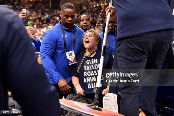 Activist chains herself to the goal during the first half of Game One of the Western Conference First Round between the Memphis Grizzlies and the...