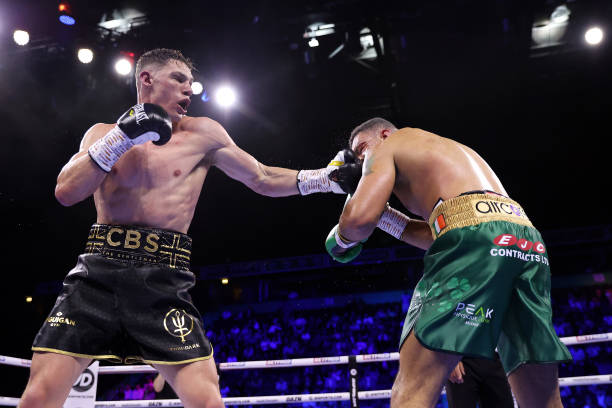 Chris Billam-Smith punches Tommy McCarthy during the European & Commonwealth Cruiserweight fight between Chris Billam-Smith and Tommy McCarthy at AO...