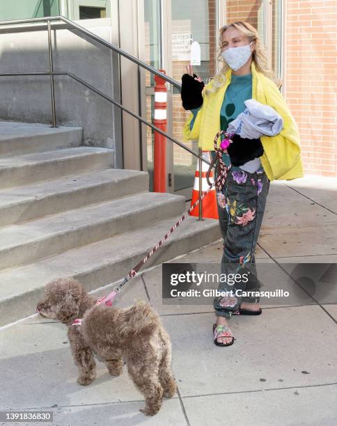 Kristin Chenoweth is seen walking her dog Thunder on April 16, 2022 in Philadelphia, Pennsylvania.